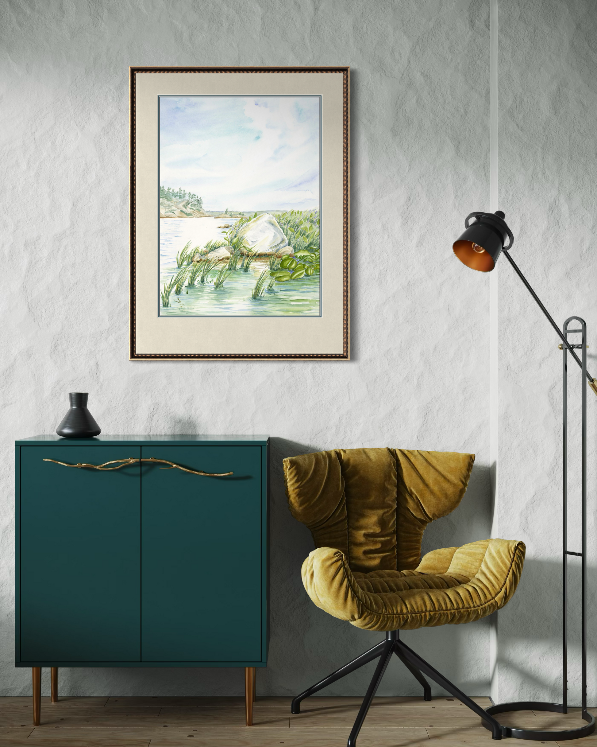 Framed Granite and Wind watercolor print of Georgian Bay landscape displayed above a cabinet in a contemporary living space.