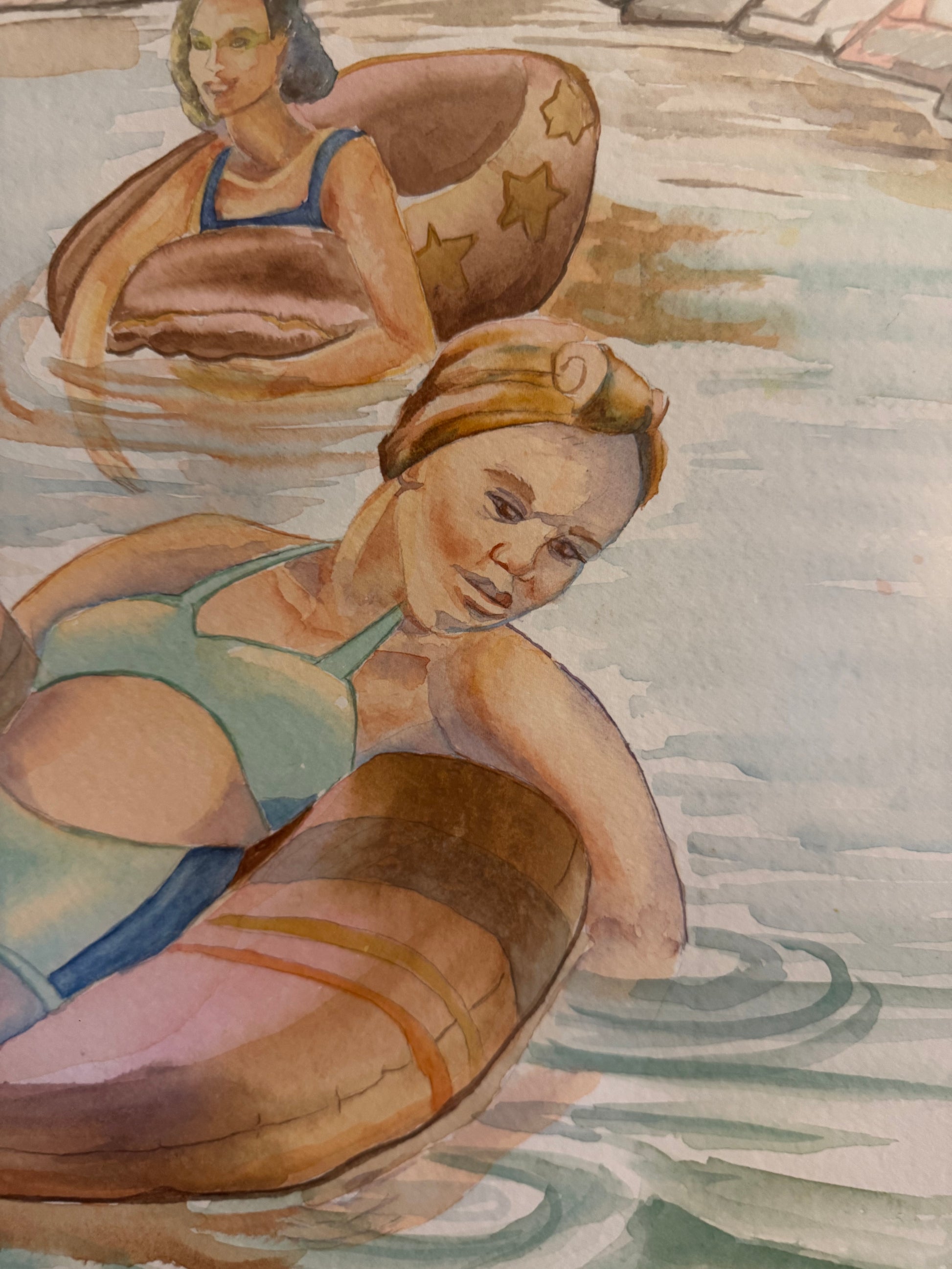 Detail of the original watercolor "Pink Skies" by Pamela Hallock, highlighting transparent watercolor washes, gentle reflections, and two women floating on Georgian Bay.
