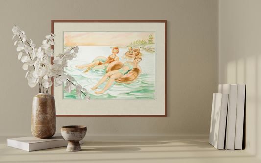 Framed Pink Skies watercolor print displayed above a shelf in a neutral interior