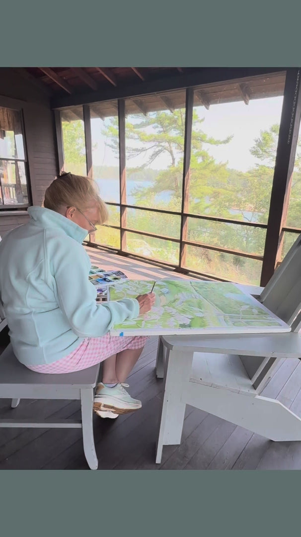 Pamela Hallock painting Midwest Garden watercolor in her studio